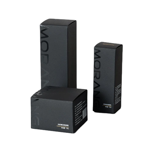 This set of matte black cardboard packaging boxes supplies abundant specifications ranging from short square containers to varied tall rectangular sizes. Made from sturdy thick duty paper material, the box surface supports vertical brand logo printing and customized label information. The neat solid black minimalist appearance suits creams cleansers serums and other skincare items. We accept personalised dimension adjustments surface craft processing and logo printing service, suitable for cosmetic brand packing and large scale wholesale supply.