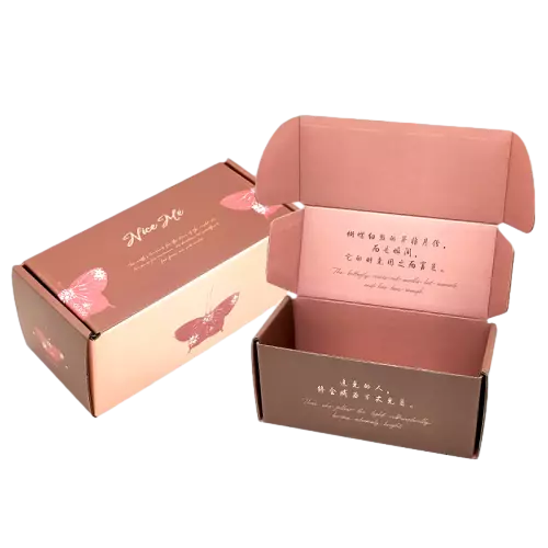 These stylish custom printed corrugated mailer boxes come in multiple distinctive surface prints including checkered flower abstract artwork minimalist curvedline and vintage hotstamped butterfly designs. Made of sturdy lightweight corrugated cardboard the foldover lid structure is easy to assemble and offers great compression resistance for transit protection. Custom logo slogan and interiorlid printing service is supported. Suitable for apparel cosmetics handmade gifts and boutique goods packaging available for large order wholesale customization.