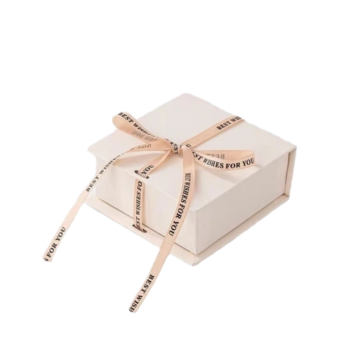 This minimalist flip top magnetic rigid gift box comes in multiple textured exterior colour selections including cream white, deep black and mustard yellow. It is matched with detachable satin ribbon printed with warm wish text for elegant wrapping decoration. The sturdy thick cardboard maintains sharp box shape, and the built in magnet enables smooth opening and tight closure. The interior can hold custom branded fabric drawstring pouches for jewellery, trinkets and cosmetics. Custom surface texture, personalized ribbon printing and bespoke sizing service are supported, well suited for holiday gifts, party favours and brand retail bulk order wholesale.