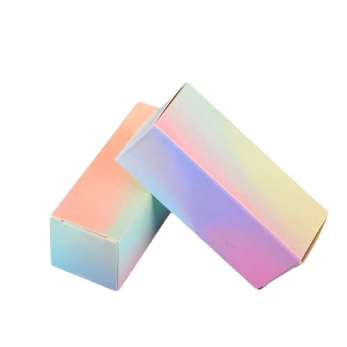 These fashionable long shaped cardboard boxes are covered with eye catching holographic rainbow gradient surface with shifting pastel colours under light. Constructed from durable foldable paper material, the compact rectangular size perfectly suits lipstick, perfume sample and mini sized beauty goods. Custom printed brand logos, personalised surface finishes and tailored dimensions are available. The shiny delicate appearance works well for cosmetic gift packing, retail sales and large scale wholesale orders.