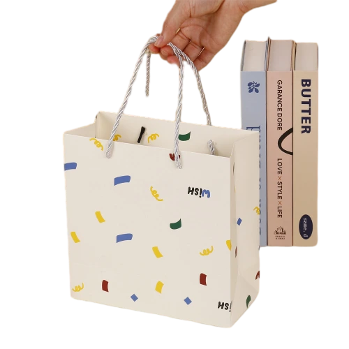 This playful gift box kit comes with a flip top custom rigid box and a matching rope handle paper tote bag, both decorated with lively multicolored confetti style prints and custom WISH letter printing. Made of thick sturdy paper material for anti deformation performance. You can fill the inner compartment with shredded paper filler, plush ornaments, perfume, snacks and assorted small size gifts. Custom printed surface patterns, brand logos and dimension adjustments are available, well suited for birthday surprises, party give aways, holiday gift giving and wholesale order customization.