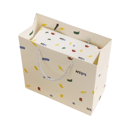 This playful gift box kit comes with a flip top custom rigid box and a matching rope handle paper tote bag, both decorated with lively multicolored confetti style prints and custom WISH letter printing. Made of thick sturdy paper material for anti deformation performance. You can fill the inner compartment with shredded paper filler, plush ornaments, perfume, snacks and assorted small size gifts. Custom printed surface patterns, brand logos and dimension adjustments are available, well suited for birthday surprises, party give aways, holiday gift giving and wholesale order customization.