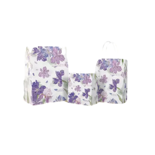 These beautiful coated art paper bags are covered with delicate watercolor purple iris floral prints on clean white background. Durable white twisted paper rope handles bring comfortable carrying experience. Three different sizes can meet multiple packaging needs for gifts snacks cosmetics and flower shop goods. The smooth coated paper surface presents bright and clear printing effect. Custom logo and pattern printing service is supported for brand promotion. With fresh romantic appearance, these bags fit well for birthday presents wedding favors boutique retail packaging. Wholesale bulk orders are welcomed.
