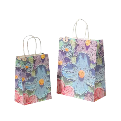 These artistic coated art paper bags are decorated with eye catching oil painting style colorful flower prints that create a three dimensional textured visual effect. Durable white twisted paper rope handles provide comfortable and stable carrying experience. Two available sizes satisfy different packaging needs for gifts snacks cosmetics and boutique goods. The smooth coated paper delivers bright saturated printing color. Custom logo and artwork printing service is supported for brand display. With a warm creative appearance, these bags are ideal choices for birthday gifts party favors and retail merchandise packaging. Wholesale bulk orders are welcomed.