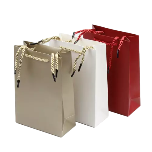 These versatile special craft paper bags are made with smooth matte solid color paper in multiple elegant shades. Thick twisted paper rope handles are fitted with hard plastic tips to prevent fraying and make threading easy during production. The tall vertical rectangular shape offers plenty of inner space for bottle shaped gifts and other long items. Heavy weight craft paper keeps the bag stable and well structured when loaded. Custom logo printing can be added on the outer surface for brand display. These practical paper bags fit well for holiday gifts wine packaging and daily boutique retail use. Wholesale bulk orders are welcomed.