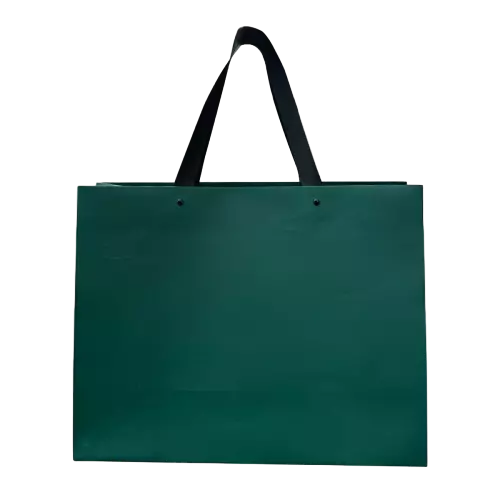 These premium special craft paper bags feature elegant dark green matte finish with large horizontal wide base design. Broad black fabric ribbon handles are firmly secured by metal rivets to enhance loading strength and prevent tearing. Thick high grade paper keeps the tote upright even when fully filled. Blank surface allows you to print custom logo brand name and decorative patterns for brand building. This generous sized paper bag is an ideal packaging choice for clothing retail boutique shopping and high end gift delivery. Wholesale bulk orders are welcomed.