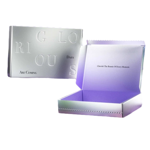 This eye catching holographic custom rigid box is made of thick sturdy hardboard with shiny iridescent silver outer surface. Raised embossed lettering on the cover delivers a subtle high end branding effect. The interior features elegant purple gradient lining with custom printed slogan to create an impressive unboxing experience. You can customize inner foam inserts to fit serums makeup and skincare sets. Its durable rigid construction safeguards beauty items during shipping and retail shelf display. It is a fashionable packaging selection for cosmetic brands and large volume wholesale orders.