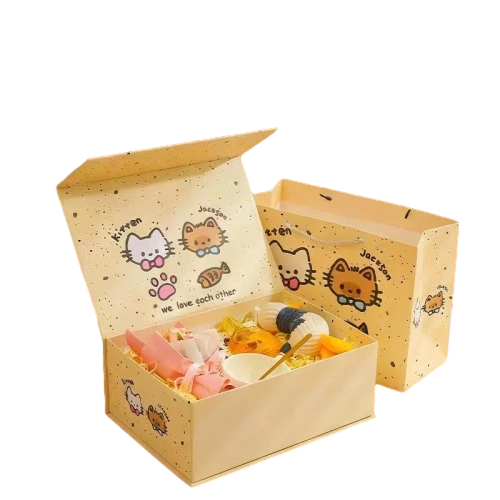 This lovely cream toned custom rigid box is built with thick hardboard and finished with delicate speckled outer paper. Cute hand drawn kitten cartoon graphics and custom text can be printed on both the outer shell and inner lid. It comes with hidden magnetic closure for easy opening and secure sealing. Matching printed paper gift bag can be supplied as a full packaging set. Spacious inner space fits shredded filler and assorted gift items for kids birthday baby shower and festival giveaways. Its solid rigid shell offers great protection for contents during transit and festive display. It is a playful premium packaging solution for gift shops and large volume wholesale orders.