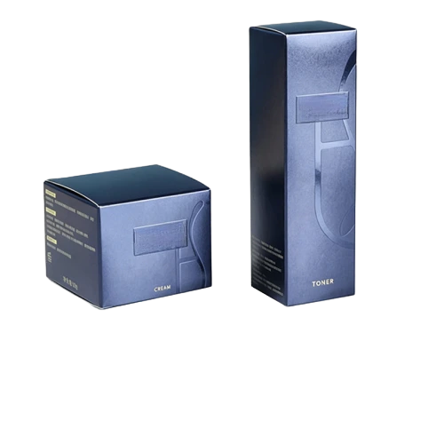 This set of multisize custom cardboard boxes is crafted from premium metallic dark blue paper with subtle shimmer finish. Elegant debossed geometric patterns and clear gold printed labels mark different skincare items such as toner and cream. You can choose square or tall vertical box shapes to match glass jars and pump bottles. Custom embossed logos ingredient lists and brand information can be added on side panels. The thick cardboard structure offers stable outer protection for high end cosmetics during transit and luxury retail shelf display. It is an upscale minimalist packaging choice for skincare brand suppliers and large volume wholesale orders.