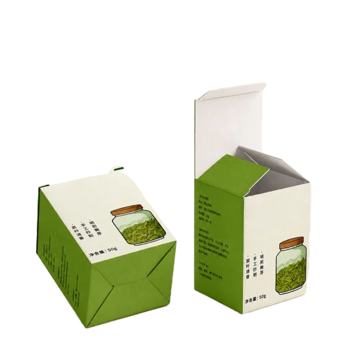This square foldable custom cardboard box is made of eco friendly high quality paper with clean matte surface. The twotone green and white exterior is printed with vivid tea jar illustration and product text information. Autolock bottom structure provides strong loadbearing capacity for loose tea leaves. Detailed product introduction and net weight marks can be printed on side panels. You can customize box dimensions color schemes artwork and text content to hold green tea herbal tea and other dried food products. Durable cardboard keeps inner tea fresh and well protected during longdistance transport and tea shop shelf display. It is a fresh natural style packaging choice for tea suppliers and large volume wholesale orders.