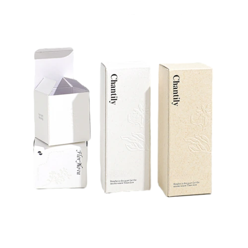 This tall rectangular custom cardboard box is crafted from premium smooth white and natural textured fiber paper for an understated luxury look. Delicate embossed floral patterns add subtle threedimensional texture without extra colorful printing. Debossed brand name and slogan can be customized on the outer surface. You are allowed to adjust box sizes paper textures and embossed artwork to match toner bottles serums and other skincare containers. Sturdy foldable cardboard offers solid protection for cosmetic goods during shipment and boutique retail shelf display. It is an ideal minimalist high end packaging solution for natural skincare brand suppliers and large volume wholesale orders.