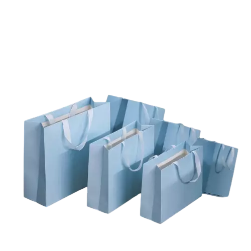 These clean blank paper gift bags are made of premium thick paper finished with soft solid baby blue color. Durable wide white fabric ribbon handles deliver comfortable grip and excellent weight bearing performance. A full set of different sizes is provided to meet various packaging demands for garments cosmetics accessories and daily presents. High quality paper material enables each bag to stand upright firmly and resist bending. The smooth blank outer surface supports custom printed logo brand slogan and decorative artwork. These versatile light blue tote bags are great packaging solutions for retail shops brand boutiques and general gift delivery. Wholesale bulk orders are welcomed.