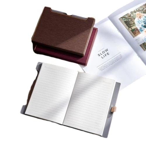These luxury business hardcover notebooks adopt premium textured PU leather covers with delicate gold edge trim and unique notched design, delivering a sophisticated high end aesthetic suitable for professional business scenarios. Each notebook comes with a side pen holder for convenient pen storage and thick lined inner pages that ensure smooth writing and prevent ink bleedthrough effectively. Packaged in an elegant matching gift box, they serve as perfect corporate stationery gifts for business partners and employees. The cover supports custom logo printing to satisfy brand customization demands, ideal for office supply procurement and bulk wholesale.