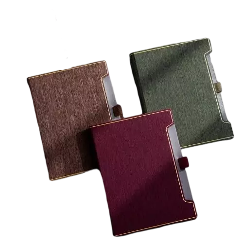 These luxury business hardcover notebooks adopt premium textured PU leather covers with delicate gold edge trim and unique notched design, delivering a sophisticated high end aesthetic suitable for professional business scenarios. Each notebook comes with a side pen holder for convenient pen storage and thick lined inner pages that ensure smooth writing and prevent ink bleedthrough effectively. Packaged in an elegant matching gift box, they serve as perfect corporate stationery gifts for business partners and employees. The cover supports custom logo printing to satisfy brand customization demands, ideal for office supply procurement and bulk wholesale.
