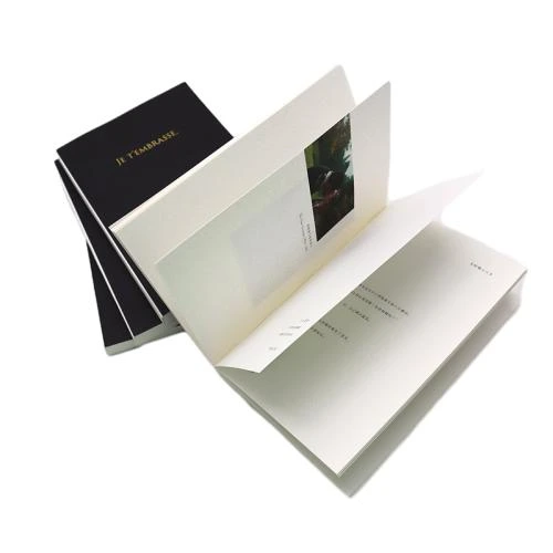 This premium soft cover notebook features sleek matte black outer cover matched with delicate gold hot stamped text. Adopts sturdy sewn in stitching binding for full flat opening. The thick cream toned inner sheets are printed with classic oil painting artwork and literary text, blending practical writing function with artistic ornamental value. Custom made hot stamped logo, cover printing and inner page design services are available. It fits for daily diary writing, reading notes, office records, art collection and high end gift giving, suitable for large quantity stationery procurement and wholesale trade.