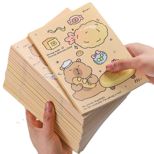 These adorable softcover notebooks adopt eco friendly soft paper covers printed with varied lovely kawaii capybara cartoon illustrations. It applies durable sewn in stitching binding for flat open writing. Premium thick lined inner pages prevent ink bleed and deliver smooth handwriting experience. Multiple distinctive cartoon cover options are available. Compact lightweight build makes it suitable for school coursework, daily note taking and pocket carrying. Custom printed logo and pattern service is supported. Ideal for student stationery, cute souvenir gifts and large volume wholesale orders.