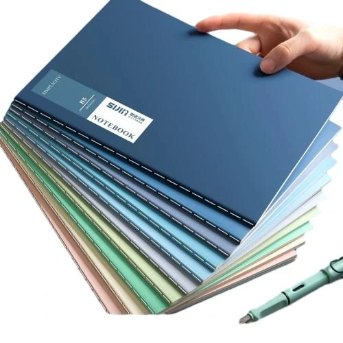 These minimalist soft cover notebooks adopt premium matte solid color outer covers with full range soft Morandi and macaron toned colour selections. Adopted durable long stitch sewing binding for flat lay flat opening and long term usage. Available in A5 and B5 common sizes. High density thick lined inner pages deliver fluent handwriting and guard against ink seepage. The plain style cover supports custom sticker, brand label and logo printing. Suited for workplace records, school coursework, meeting notes and daily planning, fit for bulk stationery orders and resale.