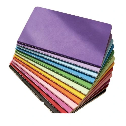 These minimalist softcover notebooks come in rich rainbow toned solid color matte PU leather covers with smooth rounded corners and durable side stitching binding. Multiple bright and gentle colour selections satisfy diverse preference for school, workplace and daily record scenarios. The thick high quality lined inner pages deliver smooth writing friendly performance and resist ink penetration. Its lightweight slim build supports easy carry around. Custom logo embossing and surface printing services are available for brand customized demands. Suitable for retail sales, corporate give aways and large quantity wholesale procurement.