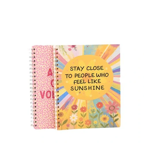 This two style metal wire o spiral notebook set features trendy pink leopard skin custom slogan cover and boho sunflower inspirational quote printed cover. The durable double loop metal spiral binding permits 180 degree flat open writing. Premium thick lined inner sheets prevent ink bleed. Custom cover artwork, personalized volunteer group text and brand logo imprint are supported, suitable for volunteer event souvenirs, daily mood diaries, school stationery, activity give aways and bulk wholesale orders.