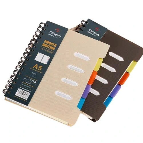 This tab divider spiral bound notebook is available with A5 and B5 two mainstream sizes and assorted matte solid colour outer covers. Equipped with four piece colourful index tabs for quick access file classification, the sturdy metal double ring coil binding supports 180° flat open writing. The premium thick lined inner pages deliver smooth handwriting performance and resist ink smudging. Custom printed cover patterns and brand logo service are offered, well suited for workplace planning, school subject note taking, daily memo keeping and large scale wholesale purchase.