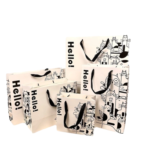 Special Craft Paper Bags come in multiple sizes with clean off white base decorated with minimalist black line drawing cats. Hello text is printed on the side to add lively fun vibe. Smooth black ribbon handles are firmly fixed on bag body for easy carrying. Thick premium craft paper keeps the bag upright and maintains nice shape. Crisp printing presents clear cartoon lines without blurring. We support custom size custom animal artwork ribbon style and brand logo printing. These cute paper bags fit gift stores cosmetic boutiques birthday gifts baby shower favors and small commodity retail packaging.