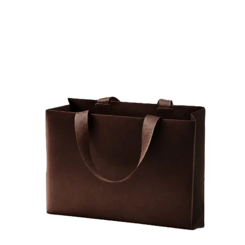 Special Craft Paper Bags adopt minimalist plain dark brown matte finish without extra patterns. Matching wide brown ribbon handles are sturdy and soft to touch, bringing premium texture. Thick rigid craft paper keeps the bag upright and holds shape steadily. The simple low key design highlights brand temperament perfectly. We support custom bag size base color brand logo and printing style. These paper bags work great for clothing shops fashion boutiques luxury gift packing and daily brand shopping use.