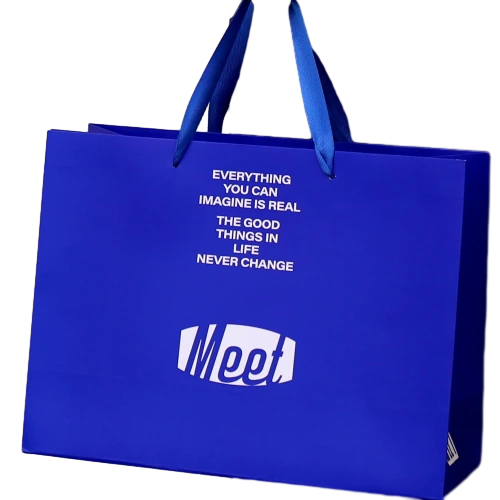 Special Craft Paper Bags adopt trendy klein blue solid surface printed with white inspirational text and Meet logo. Matching blue wide ribbon handles are sturdy and smooth for easy carrying. Thick premium craft paper keeps the bag rigid and maintains great shape. The high saturation blue brings strong modern fashion sense for brand retail and gift delivery. We support custom bag size base color printed text and brand logo. These paper bags fit fashion shop packing cosmetic boutique shopping birthday gifts and holiday gift sets.