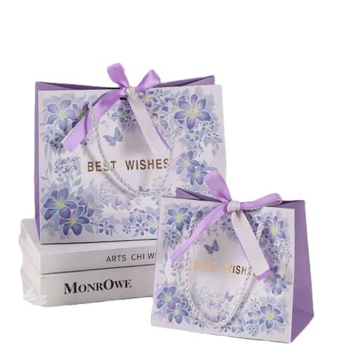 Special Craft Paper Bags feature soft lavender purple surface fully printed with delicate blue purple flowers and butterfly patterns. Gold foil BEST WISHES text is stamped in the center for elegant blessing. Purple twisted rope handles are sturdy and matching. Purple satin bow ties on top to enhance romantic gift atmosphere. Two sizes available to suit different present packing needs. Thick premium craft paper keeps the bag upright and maintains nice shape. We support custom bag size floral artwork bow style and brand logo. These paper bags fit wedding favors flower shop gifts birthday presents cosmetic packaging and holiday gift sets.