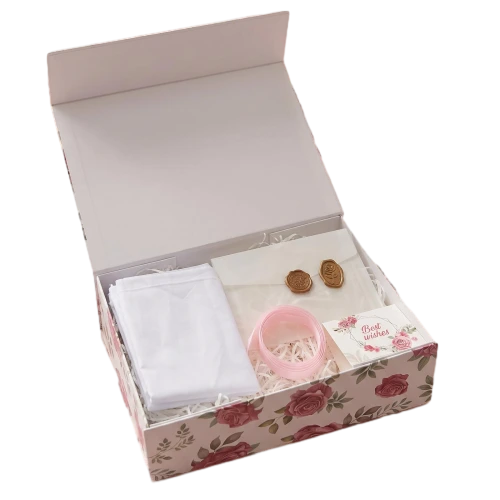This beautiful floral custom rigid magnetic box is printed with delicate vintage rose patterns on the outer surface. The inner side of the lid adopts clean light beige finish. The spacious interior can hold shredded paper filler greeting cards wax seal envelopes and other gift accessories. Strong magnetic closure keeps the box securely shut. Premium thick rigid board maintains perfect box shape and brings romantic warm unboxing experience. Full customization service is available for logo printing surface designs lining colors and box sizes. It fits well for wedding favors bridal shower gifts birthday hampers handmade presents and boutique retail packaging.