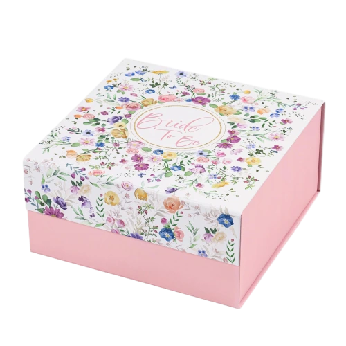 This romantic custom rigid magnetic gift box features vivid watercolor wildflower prints covering the top lid. The box body adopts soft matte pink finish for gentle visual contrast. The central text design is perfectly suited for bride themed celebrations. Built in magnet provides convenient and secure closure. Thick high quality rigid board keeps the box firm and delivers a warm festive unboxing experience. Full customization is available for printed artwork slogan content lining colors and box dimensions. It fits well for bridal shower gifts bachelorette party favors wedding keepsakes and ladies celebration gift sets.