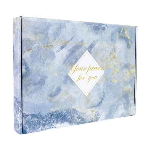 This elegant custom corrugated shipping mailer box is decorated with soft blue watercolor marble texture scattered with delicate golden vein details. Golden script text inside a diamond frame brings a high end luxurious touch to your gift. Thick corrugated cardboard provides stable buffer protection for your products during delivery. The carton is crafted from eco friendly recyclable paper material. We offer full customization on surface prints colors sizes and brand logos. It fits well for wedding favors anniversary presents cosmetic goods and high end handmade retail items.