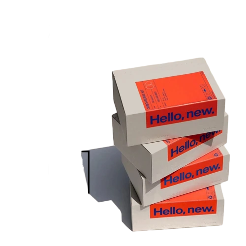 This minimalist rectangular custom cardboard box uses soft beige as its main background color. A striking bright orange banner area is printed on the front with bold blue slogan text to create fresh contrast visual effect. Standard tuck top foldable design allows flat delivery which helps to reduce shipping costs. Thick and sturdy cardboard can provide reliable protection for cosmetics small accessories sample kits and other lightweight goods. You are free to adjust banner color slogan content text font box size and add exclusive brand logo. It fits well for sample kits beauty gifts retail accessories small business merchandise and brand promotional packaging.