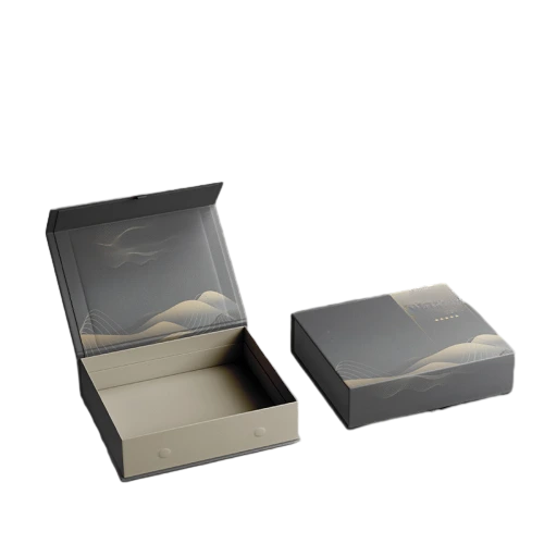 This sophisticated custom rigid magnetic gift box features elegant golden mountain landscape artwork printed on dark grey outer and inner lid surface. The inner base comes with soft beige tone which creates comfortable color contrast. Hidden magnet allows easy opening and tight secure closure. Thick heavy duty rigid cardboard delivers stable structure and premium hand feel. You can customize surface printing brand logos inner lining colors and outer dimensions. It fits well for tea gifts health care product sets corporate souvenirs festival presents and highend luxury retail packaging.