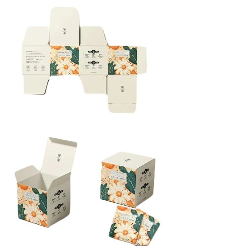 This die cut fold flat custom cardboard box can be unfolded into flat sheets before assembly. Bright fresh artwork of daisy flowers orange fruits and green leaves covers the outer surface. Product labels ingredient information and instruction marks can be printed on multiple sides. The box folds easily into a sturdy square container to hold tea sachets small snack packets and other lightweight food goods. Flat shipping greatly reduces your transport cost. You can change floral patterns color schemes printed information and brand logo. It fits well for tea bags herbal drinks dried snacks small edible packets health food and handmade food gift packaging.